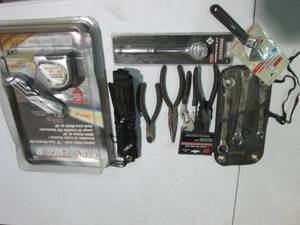 lot 84 image: Measuring tape, lighted Utility kni...