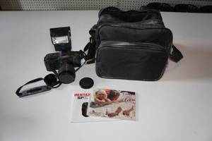 lot 73 image: Vintage Canon T70 35mm SLR Camera