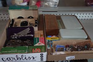 lot 198 image: Singer Sewing Machine Accessories - Needles, Cams, Bobbins