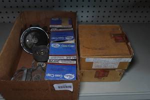 lot 214 image: Gas Caps and Hub Sets