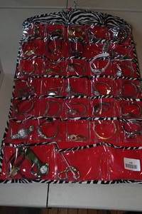 lot 168 image: Hanging Jewelry Organizer Loaded with Wristwatches