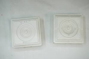 lot 56 image: 50ct White MDF Rosettes 78x 2.5 (includes grey bin)