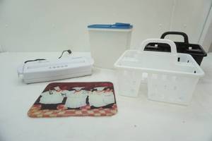 lot 102 image: Tupperware Container, Paper Shredder, Glass Cutting Board, Shower Caddies