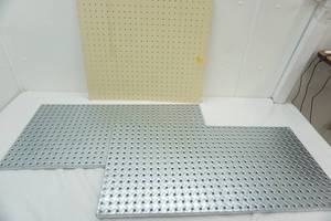 lot 106 image: 2 Metal Peg Boards 1 Masonite Peg Board