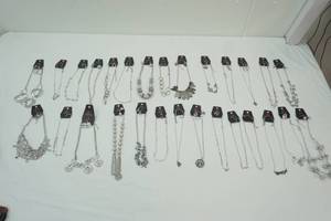lot 126 image: (28ct) NEW Paparazzi Necklace & Earring Sets (Silver color lot)