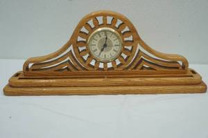 lot 215 image: Carved Wooden Mantle Clock 16 across