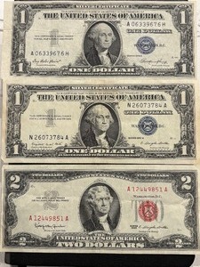 lot 137 image: Red and Blue Seal Silver Certificates and Note