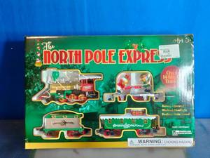 lot 39 image: North Pole Express Christmas train set.