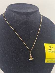 lot 20 image: 14kt Yellow Gold Sailboat Pendant with 14kt Yellow Gold Chain
