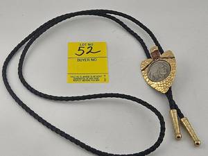 lot 52 image: Silver Arrow Shaped Bolo