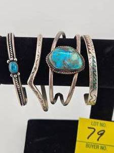 lot 79 image: Navajo & Zuni Four Silver Bracelets