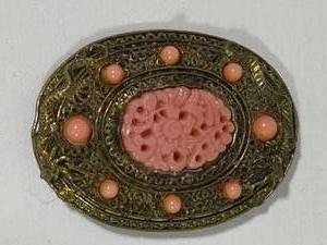 lot 59 image: Vintage Carved Celluloid & Filigree Brooch