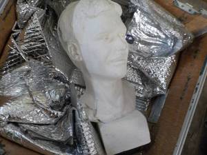 lot 227 image: 1 Plaster Dcor Head in a storage ...