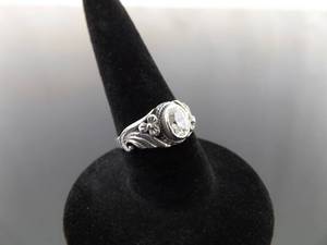 lot 76 image: .925 Sterling Silver Scrolled Zirconia Flower Ring Size 4.75