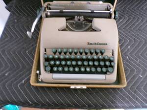 lot 41 image: Vintage Smith Corona Sterling Portable Typewriter