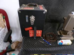 lot 42 image: Lot of 3 Antique 16mm Projectors With Nice Screen & Lots of Antique Movies