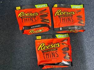 lot 180 image: 3 Bags Of ReeseS Cark Chocolate Thins