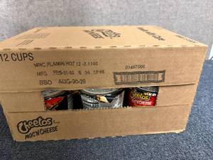 lot 202 image: 12 Cups Of Cheetos Flamin Hot Mac And Cheese