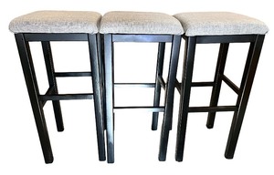 lot 18 image: Set of 3 Upholstered 30 Bar Stools with Black Wood Frame