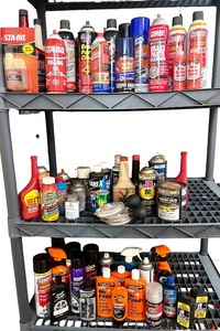 lot 29 image: Large Automotive Fluids and Car Care Collection with Cleaners, Polishes, and Additives