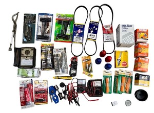 lot 89 image: Automotive Maintenance Tool and Parts Lot with Belts, Oil Filters, and Gauges