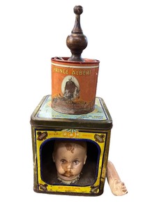 lot 97 image: Vintage Prince Albert Tin, Solid Gold Brand Tin, and Doll Parts Display Lot