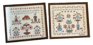 lot 119 image: Set of 2 Framed 1964 Hand-Embroidered Samplers with Alphabet and Folk Motifs