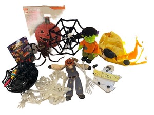 lot 131 image: Halloween Decor Lot with Plush Frankenstein, Skeletons, Spider Webs, and Pumpkin Lights