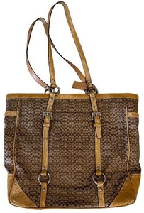 lot 136 image: Coach Signature Canvas and Leather Tote Bag