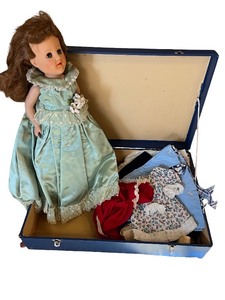 lot 139 image: Vintage Doll in Blue Dress with Trunk and Assorted Outfits