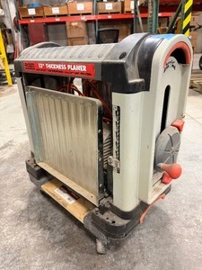 lot 75 image: Ridgid 13 in. Thickness Corded Planer has a 15 Amp motor. Thickness indicator on front