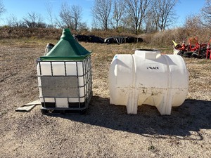 lot 103 image: (2) Liquid storage tanks, one is a IBC in a protective cage.