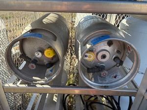 lot 42 image: (2) tanks for fork lift (middle shelf)