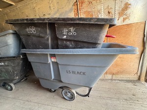 lot 167 image: Utility Tilt Trucks the black with red handles truck is by Rubbermaid