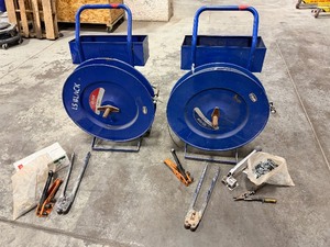 lot 201 image: (2) Blue Uline Strapping Carts, strapping tools and seals for strapping