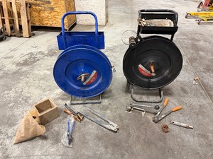 lot 202 image: (2) Uline Strapping Carts, strapping tools, small box and seals for strapping