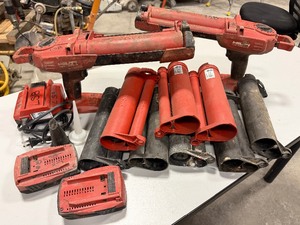 lot 347 image: (1) Hilti HDE 500-A18 (1) HDE 500-A22 adhesive dispenser, (3)Red cartridge Holders, (5)Black Powder cartridge Holders. Hilti B 222.6 Li-on Battery, C436-90 charger, (2) dispenser nozzles,