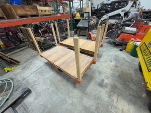 lot 394 image: (2) Nutting Wood Factory Carts with four posts, removable.