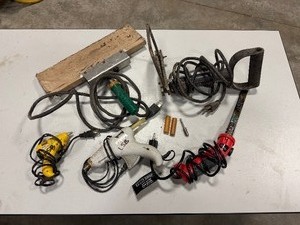 lot 389 image: L & H Mfg. Co. Brander No. 54,  Stanley hot glue gun, Ace Glue Gun, Heated splicing iron, and hot knife