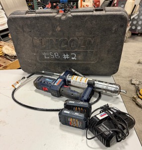 lot 401 image: Lincoln Powerluber cordless grease gun Model 1890  in case with Lithium 20v battery & charger