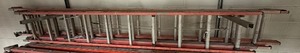 lot 508 image: (1) 22 extension ladder. (1) 24 extension ladder