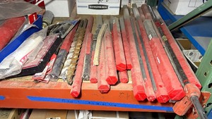 lot 530 image: (15) Hilti Hammer drill bits various sizes and steel chisels in protective cases