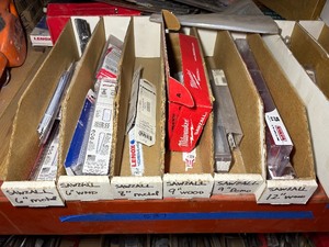 lot 537 image: Sawzall Blades, various brands and sizes. Most look to be new in package