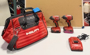 lot 527 image: (2)  Hilti SID 4-A22 Impact drivers with batteries and a charger in Hilti bag.