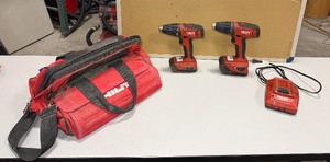 lot 523 image: (2) Hilti SFC 22-A cordless drill drivers with batteries and a charger with Hilti bag