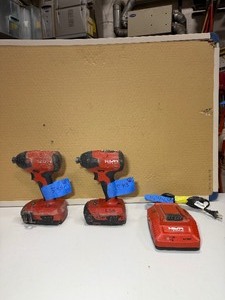 lot 543 image: (2) Hilti SID 4-A22 Impact drivers with batteries and a charger