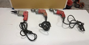 lot 587 image: (3) Milwaukee corded 6758 screw shooter 75 Anniversary 0234-75 Magnum  drill Magnum hole shooter