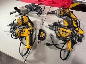 lot 588 image: DeWalt&Bosch Drywall Screwdrivers, Versa Clutch Screwdriver, hammer drill, mitre gauge, Tapper drill