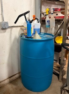 lot 598 image: Almost Full Barrel of Windex with Pump
