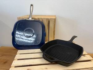 lot 3 image: 2 10-inch Cast Iron Griddles - 1 has blue enameled bottom